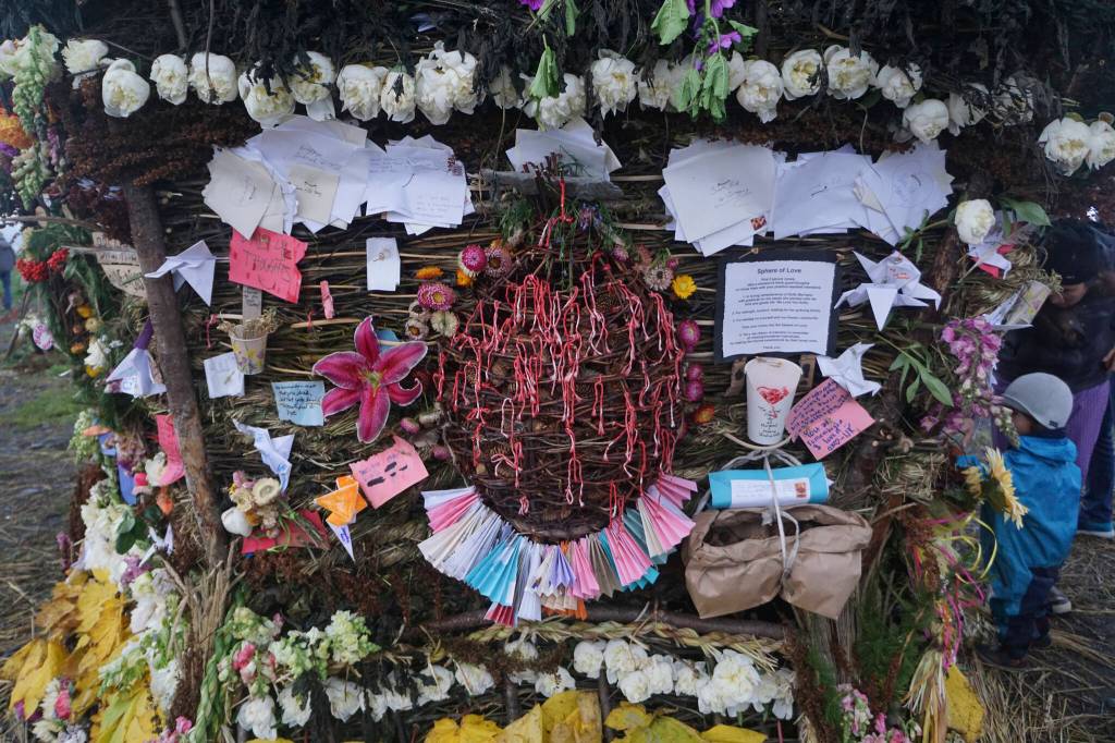 The Sphere of Love is a memorial small basket for Anesha Duffy Murnane placed on the 19th annual Burning Basket, Breathe, on Sunday, Sept. 11, 2022, at Mariner Park on the Homer Spit. People were asked to take three spruce cones, think positive thoughts, and put them in the Sphere of Love. Ribbons tied on the basket honored missing and murdered people. Murnanes family donated envelopes from cards of remembrance sent to them, and the cards were folded into fans on the basket. (Photo by Michael Armstrong/Homer News)