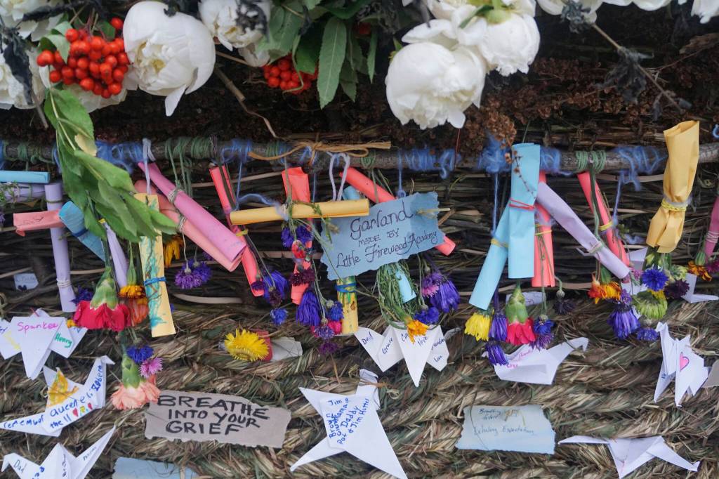 Little Fireweed Academy students made this garland for the 19th annual Burning Basket, Breathe, on Sunday, Sept. 11, 2022, at Mariner Park on the Homer Spit in Homer, Alaska. Fireweed students traditionally visit the basket during build week to help with the basket and a labyrinth. (Photo by Michael Armstrong/Homer News)