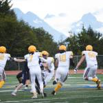 Barrow Whaler Kolo Danner sneaks past the Homer Mariner defense at the Homer homecoming game on Friday, Sept. 12, 2022, in Homer, Alaska. (Photo by Michael Armstrong/Homer News)