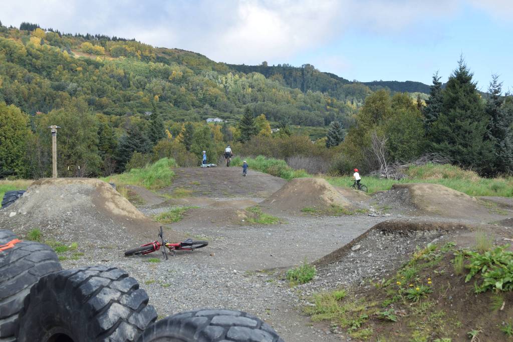 Southern Kenai Peninsula kids enjoy the new biking area at the Kachemak City Park Grand Opening on Saturday, Sept. 17, 2022. (Photo by Charlie Menke / Homer News)