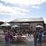 Southern Kenai Peninsula residents enjoy the party at the Kachemak City Park Grand Opening on Saturday, Sept. 17, 2022. (Photo by Charlie Menke / Homer News)