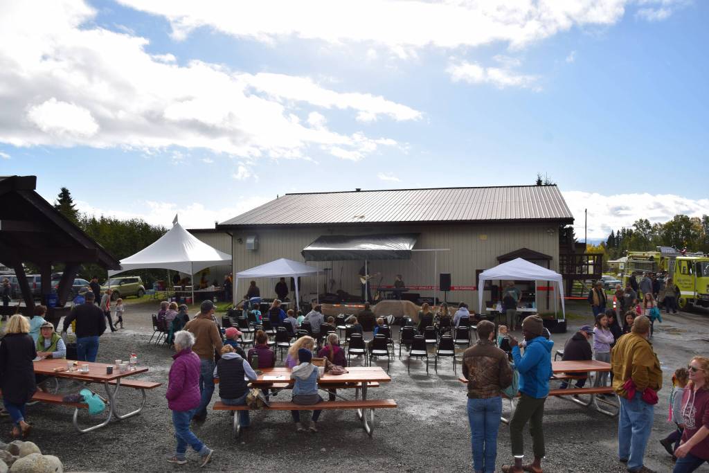 Southern Kenai Peninsula residents enjoy the party at the Kachemak City Park Grand Opening on Saturday, Sept. 17, 2022. (Photo by Charlie Menke / Homer News)