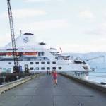 Photo by Michael Armstrong/Homer News
A jogger leaves the Silversea cruise ship Silver Wind at the Deep Water Dock on Sunday, Sept. 25, in Homer.