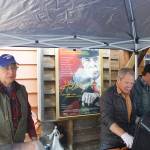 From left to right, Otto Kilcher, Carl Bice and Michael Walsh server reindeer sausages and hot dogs at the gala opening of the Homer Documentary Film Festival last Thursday, Sept. 22, 2022, at the Homer Theatre. (Photo by Michael Armstrong/Homer News)