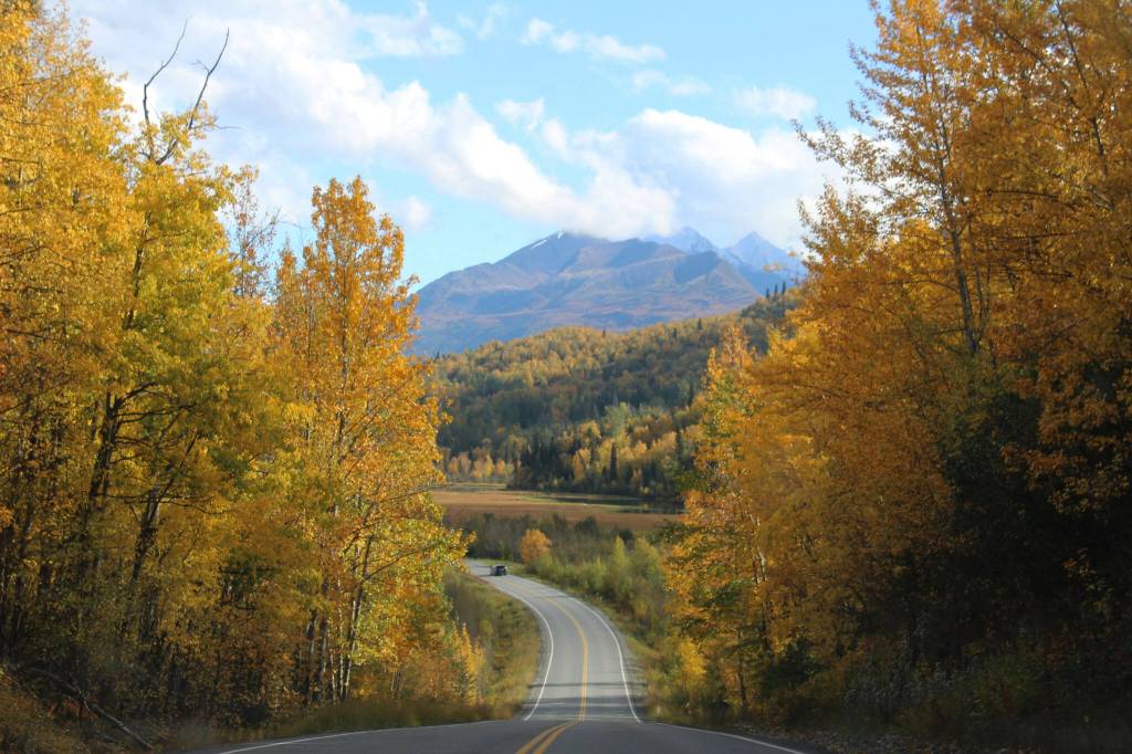 Fall colors frame Knik River Road on Saturday, Sept. 16, 2022 in Knik River, Alaska. (Ashlyn OHara/Peninsula Clarion)