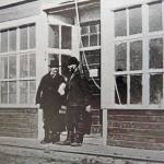 Photo from Once upon the Kenai
Captain Rose of the S.S. Tyonic, a coal-hauling vessel operating out of the Seldovia area, speaks with Bill Dawson in front of Dawsons Kenai trading post in 1915.