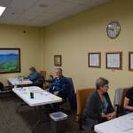 Voter registrars at the Kenai Peninsula Borough and City of Homer elections at Cowles Council Chambers on Tuesday, Oct. 4, 2022 in Homer, Alaska. (Photo by Charlie Menke/ Homer News)