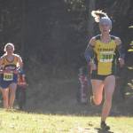 Sewards Hailey Ingalls leads the Region 3/Division II girls race on Saturday, Oct. 1, 2022 at Tsalteshi Trails just outside of Soldotna, Alaska. (Jake Dye/Peninsula Clarion)