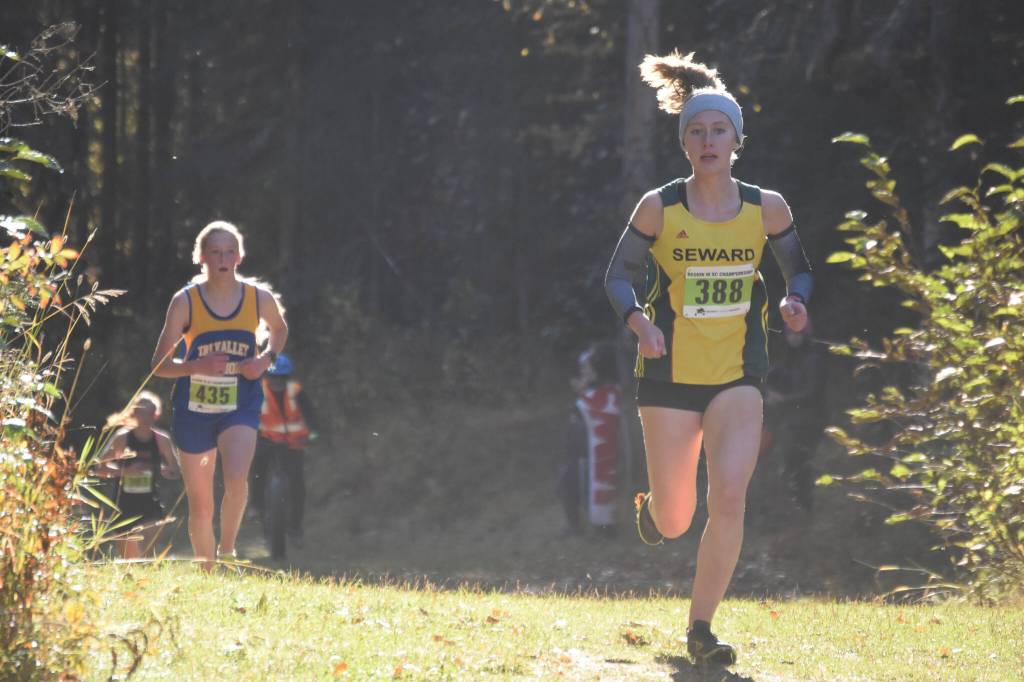 Sewards Hailey Ingalls leads the Region 3/Division II girls race on Saturday, Oct. 1, 2022 at Tsalteshi Trails just outside of Soldotna, Alaska. (Jake Dye/Peninsula Clarion)