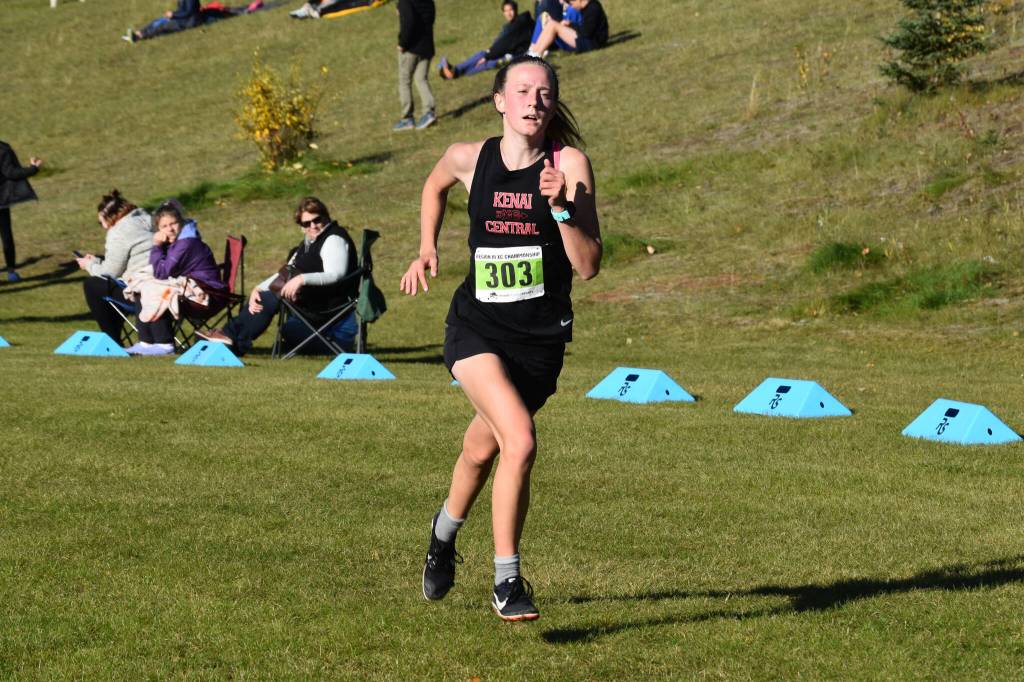 Kenais Jayna Boonstra runs down the last stretch to the finish chute during the Region 3/Division II girls race on Saturday, Oct. 1, 2022 at Tsalteshi Trails just outside of Soldotna, Alaska. (Jake Dye/Peninsula Clarion)