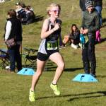 Jake Dye/Peninsula Clarion 
Soldotnas Sophia Jedlicki runs down the last stretch to the finish chute during the Region 3/Division I girls race on Saturday, Oct. 1, 2022 at Tsalteshi Trails just outside of Soldotna, Alaska.