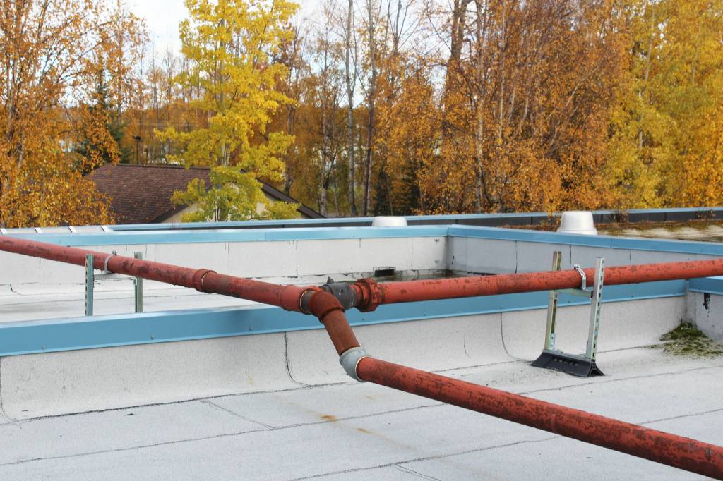Natural gas pipes, used to for heating, are anchored to the outside of Soldotna Elementary School on Friday, Sept. 30, 2022, in Soldotna, Alaska. (Ashlyn OHara/Peninsula Clarion)