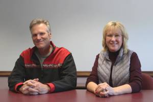Gov. Mike Dunleavy, left, and Nancy Dahlstrom sit in the Peninsula Clarion offices on Friday, July 22, 2022, in Kenai, Alaska. (Ashlyn OHara/Peninsula Clarion)