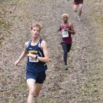 Homers Seamus McDonough leads the Division II boys race at the state cross-country meet Saturday, Oct. 8, 2022, at Bartlett High School in Anchorage, Alaska. (Photo by Jeff Helminiak/Peninsula Clarion)