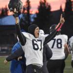 Homers Owen Storm celebrates Saturday, Oct. 15, 2022, at the Division III state championship game at Service High School in Anchorage, Alaska. (Photo by Jeff Helminiak/Peninsula Clarion)