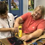 A Chapman Elementary student makes a cardboard violin (courtesy photo)