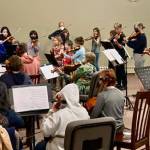 A Homer Youth Orchestra Club rehearsal is conducted by Abimael Melendez. (Photo Courtesy Kim Fine)