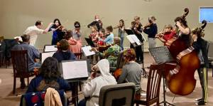 A Homer Youth Orchestra Club rehearsal is conducted by Abimael Melendez. (Photo Courtesy Kim Fine)