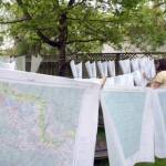 Nate Grinnell, waterproofing maps for his trip. (Photo by Julie Grinnell)