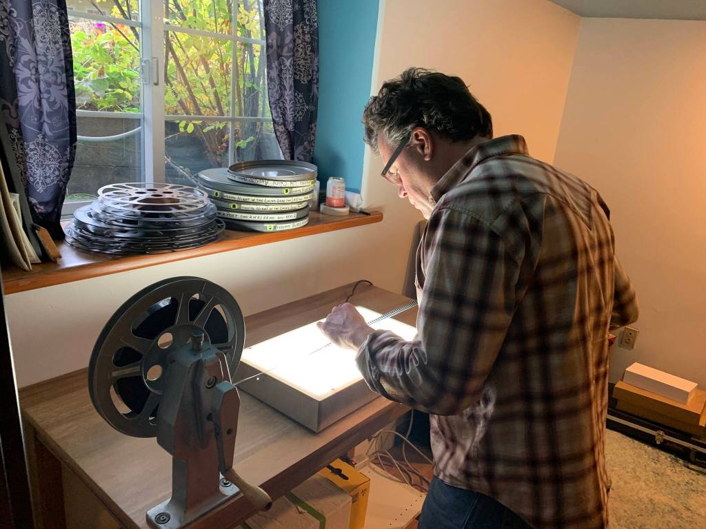 Film maker Michael Walsh at work in his studio, photo provided