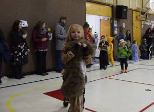 Selma, a squirrel, squeaks through the Paul Banks Elementary Halloween Parade on Monday, Oct. 31, 2022 in Homer, Alaska. (Photo by Charlie Menke / Homer News)