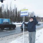 Ashlyn OHara/Peninsula Clarion
Larry Opperman waves a sign in support of Alaska House candidate Justin Ruffridge at the intersection of the Kenai Spur and Sterling highways on Tuesday in Soldotna.