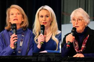 U.S. Sen. Lisa Murkowski, left, Republican challenger Kelly Tshibaka, center, and Democratic challenger Pat Chesbro discuss Arctic security, climate change and other issues during a debate Saturday, Oct. 22, 2022, at the Alaska Federation of Natives convention at the Denaina Center in Anchorage. (AP Photos/Mark Thiessen)