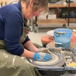 Peggy Paver uses a pottery wheel on Nov. 3, 2022, at the Homer Council on the Art's new ceramics studio in Homer, Alaska. (Photo provided)