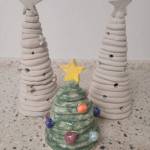 These holiday tree ceramic sculptures are examples of work that will be made in a class to be offered on Dec. 13, 2022, at the new community art space at the Homer Council on the Arts. (Photo provided)