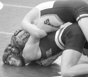 Soldotnas Jacob Strausbaugh tries to turn Palmers Kael Salisbury during the 112-pound final at the Lancer Smith Memorial wrestling tournament Saturday, in Wasilla. (Photo by Jeremiah Bartz/Frontiersman)