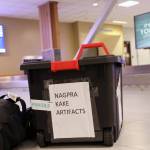 Clarise Larson / Juneau Empire
A black tote holding Alaska Native artifacts sits on the ground of the Juneau International Airport Thursday afternoon. It was flown from Seattle after being filled with 25 Alaska Native artifacts held at George Fox University in Oregon.