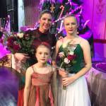 Emilie Springer, left, poses with her daughters, Aurora, bottom left, and Anna, right, after their performance in the 2019 production of the Homer Nutcracker Ballet in Homer, Alaska. (Photo provided)