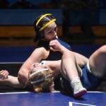 Homers Saoirse Cook holds Soldotnas Abriella Werner down during a duel wrestling meet on Tuesday, Nov. 22, 2022, at Soldotna High School in Soldotna, Alaska. (Jake Dye/Peninsula Clarion)