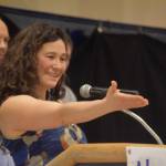 Tela ODonnell-Bacher speaks while being inducted to the National Wrestling Hall of Fame following the duel wrestling meet on Tuesday, Nov. 22, 2022, at Soldotna High School in Soldotna, Alaska. (Jake Dye/Peninsula Clarion)