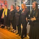 Performers in Momologue at Bunnell Street Arts Center on Dec. 17, 2022, in Homer, Alaska. (Photo by Emilie Springer)