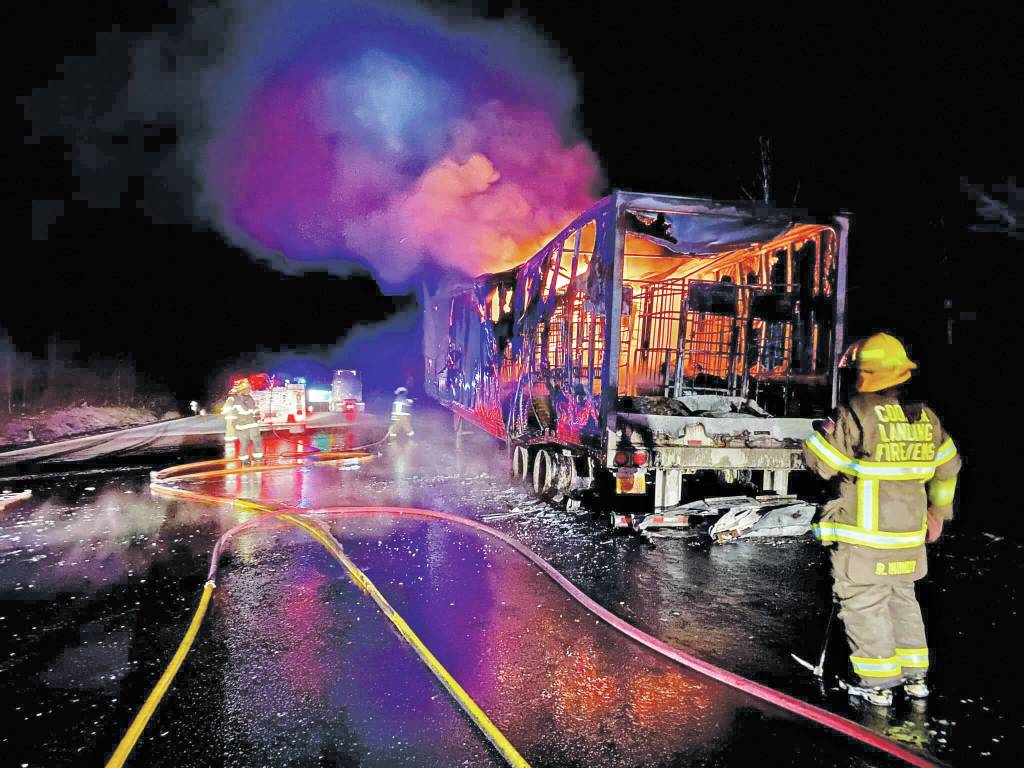 Photo courtesy of Cooper Landing Fire and EMS 
Cooper Landing Fire and Emergency Medical Services respond to a trailer fire on Tuesday, April 26 , near Mile 38 Seward Highway near Cooper Landing . The fire destroyed the trailer carrying U.S. mail from Anchorage to the Southern Kenai Peninsula.