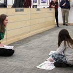 Mountain View Elementary School teacher Callie Giordano demonstrates with students word building with practices from the University of Florida Literacy Institute during a board of education meeting on Monday, Dec. 5, 2022, in Soldotna, Alaska. (Ashlyn OHara/Peninsula Clarion)