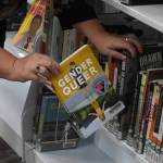 Ryanna Thurman, assistant library director, pulls a copy of Gender Queer: A Memoir by Maia Kobabe from the shelves at Soldotna Public Library in Soldotna, Alaska, on Tuesday, Dec. 27, 2022. (Jake Dye/Peninsula Clarion)
Ryanna Thurman, assistant library director, pulls a copy of Gender Queer: A Memoir by Maia Kobabe from the shelves at Soldotna Public Library , Tuesday. (Jake Dye/Peninsula Clarion)