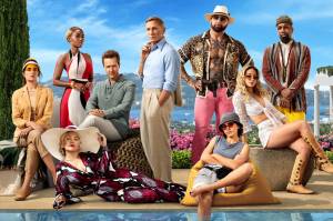 Photo Courtesy Netflix 
The cast of Glass Onion are seen in this promotional image. Daniel Craig, center, returns as Benoit Blanc, joined by Kathryn Hahn, Janelle Monáe, Edward Norton, Dave Bautista, Leslie Odom Jr., Kate Hudson, Jessica Henwick. and Madelyn Cline.