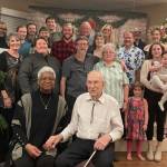 Jake McLay and his wife, Norma, celebrate his 100th birthday with relatives at Land's End in Homer, Jan. 7, 2023. (Photo courtesy McLay family)