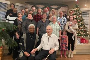 Jake McLay and his wife, Norma, celebrate his 100th birthday with relatives at Land's End in Homer, Jan. 7, 2023. (Photo courtesy McLay family)