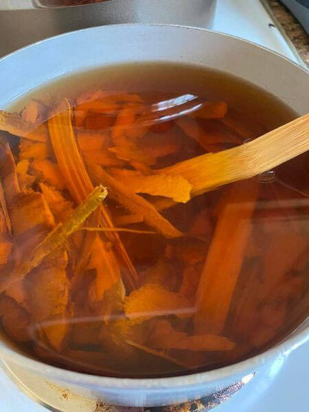 June Pardues fish skins in tanning baths of birch and willow bark. (Photo provided)