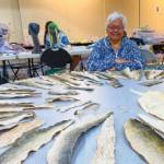 Photo provided 
June Pardue with salmon skins during a workshop.