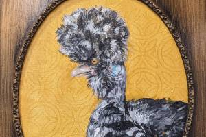 Pearl, an acrylic and coffee painting in a refurbished frame by Julianne Tomich, is one of the Pandemic Chickens on exhibit at Grace Ridge Brewing through January. (Photo by Christina Whiting/Homer News)