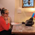 Homer artist Julianne Tomich in her home studio with her chicken Pearl. (Photo provided by Julianne Tomich)