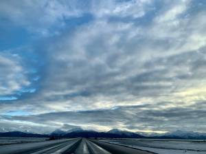 Cloudplay over the Homer Spit Road (Photo by Christina Whiting/Homer News)
