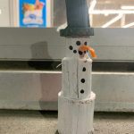 Painted wooden snowmen of various sizes and colors have been placed around town (Photo by Christina Whiting/Homer News)