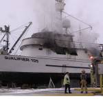 Emergency personnel respond to a fire on R/V Qualifier, in the Northern Enterprises Boatyard on Kachemak Drive, Jan. 19, 2023, in Homer, Alaska. (Photos by Nika Wolfe)