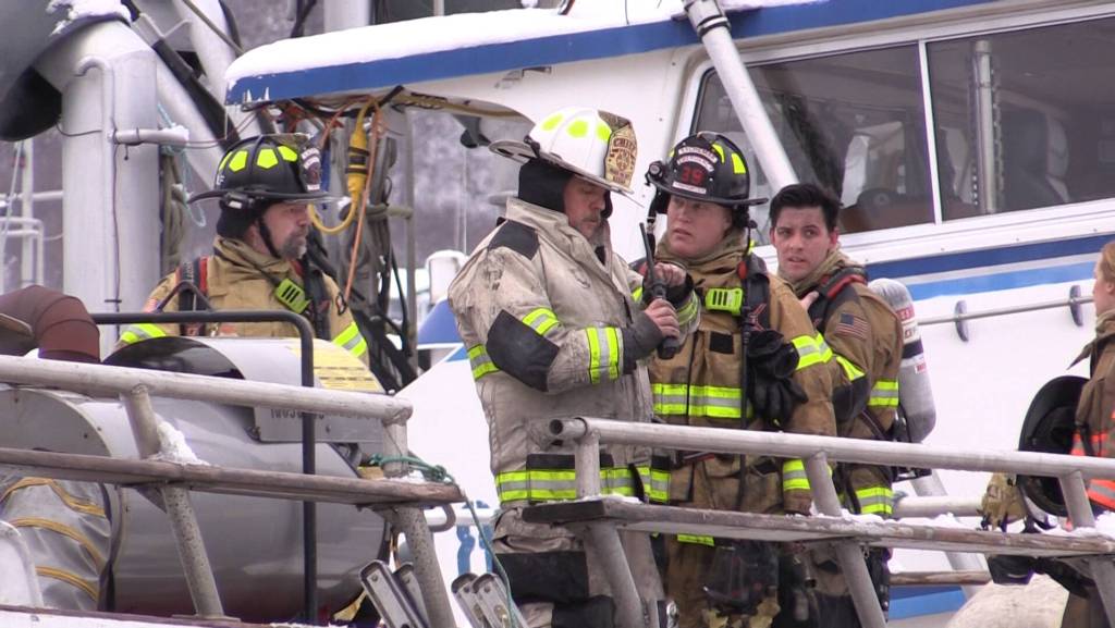 Emergency personnel respond to a fire on R/V Qualifier, in the Northern Enterprises Boatyard on Kachemak Drive, Jan. 19, 2023, in Homer, Alaska. (Photos by Nika Wolfe)