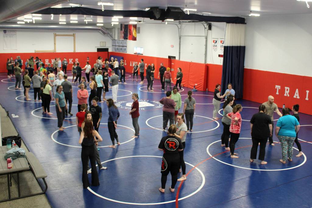 Ashlyn OHara/Peninsula Clarion
Women learn defensive maneuvers at a Toss A Cop event at the All American Training Center on Saturday, Jan. 21, 2023, in Soldotna, Alaska.